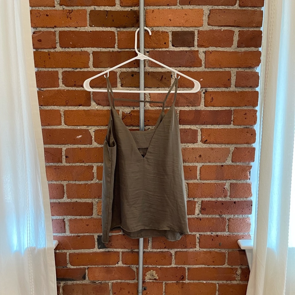 Green silky tank top. Perfect for a night out